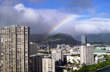 This photo of a rainbow arching over the city of Honolulu, Hawaii was taken by photographer Keith Syvinski of Franklin, Indiana.